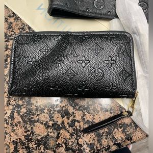 Faux lv wallet. Never used.